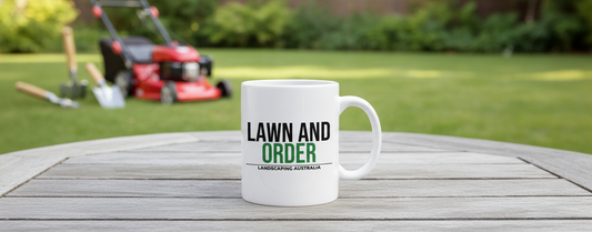 Lawn and Order Mug - lifestyle photo, garden setting